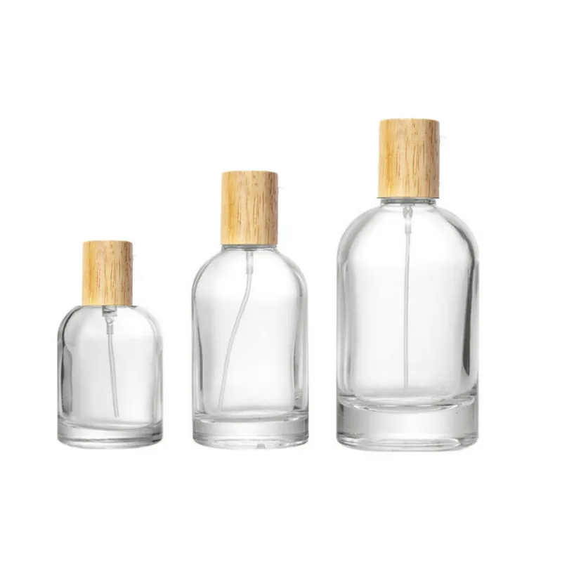 in Stocked Round 30ml 50ml 100ml Empty Glass Perfume Bottle with Plastic Metal Wood Caps