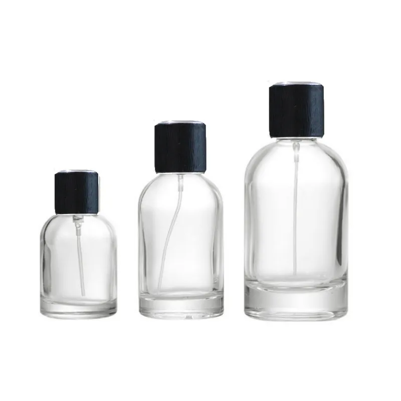 in Stocked Round 30ml 50ml 100ml Empty Glass Perfume Bottle with Plastic Metal Wood Caps