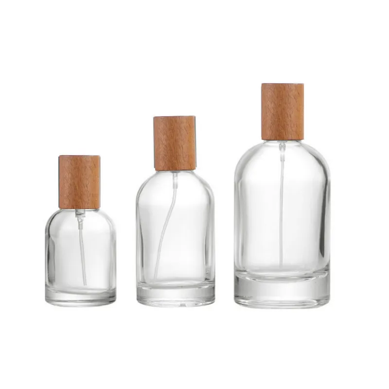 in Stocked Round 30ml 50ml 100ml Empty Glass Perfume Bottle with Plastic Metal Wood Caps