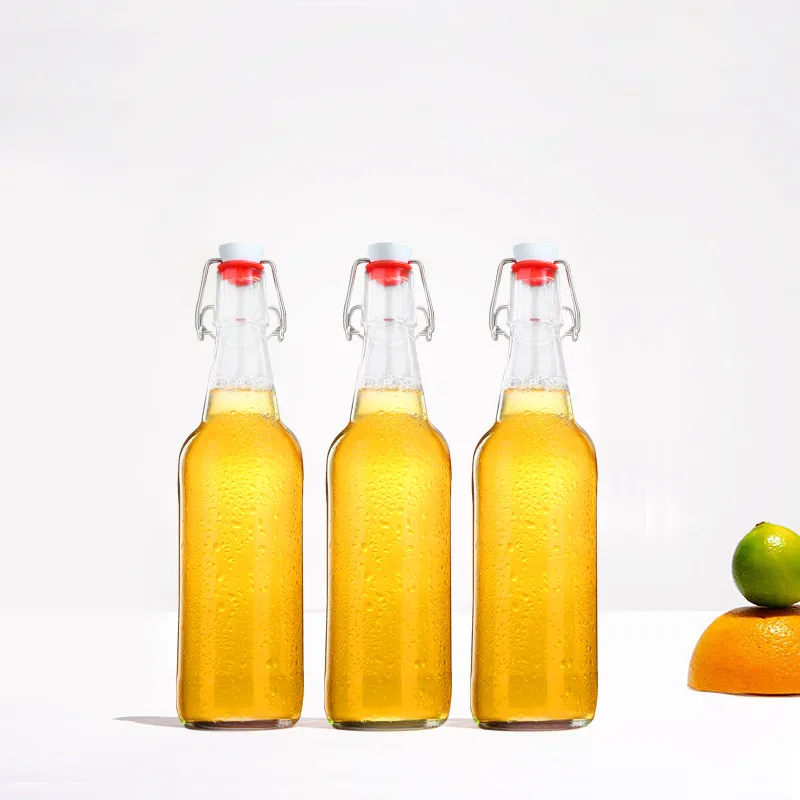 Wholesale Free Sample 330ml 500ml 750ml 1000ml Amber Glass Beer, Wine Bottle for Juice Kombucha Soda Liquor with Swing Top Caps